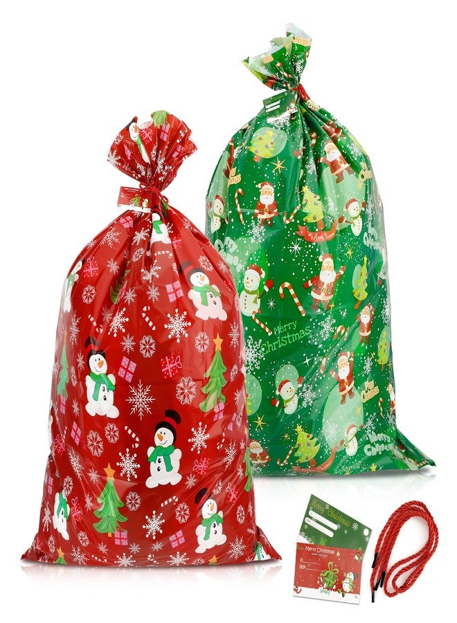 QIHOMPIB 2 Pack Christmas Gift Bags(36x48 Inch) for Presents Big Jumbo XL Huge Giant Extra Large Red Green Plastic Gift bags Sacks Bulk for Christmas Decorations Wrapping Xmas Santa Tree Snowflake Bag Pouch - Image 1